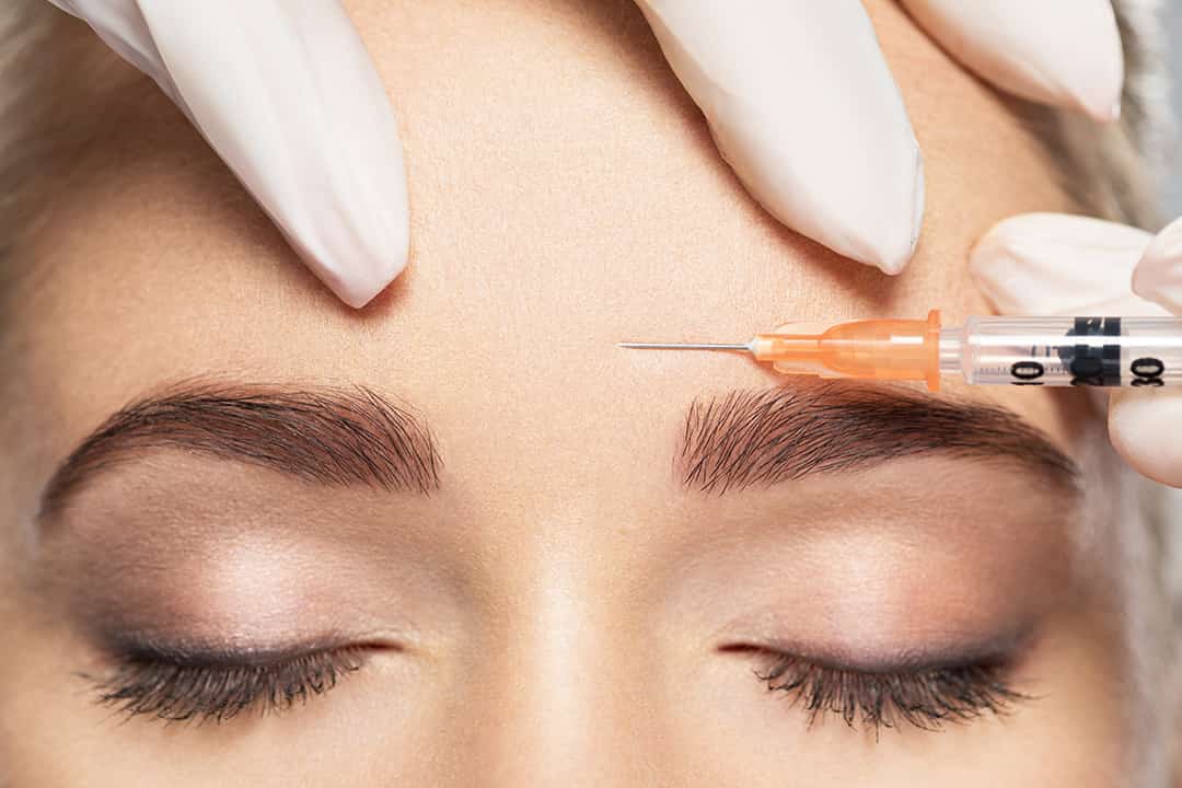 Woman getting cosmetic injection of botox, newman & company, new braunfels texas